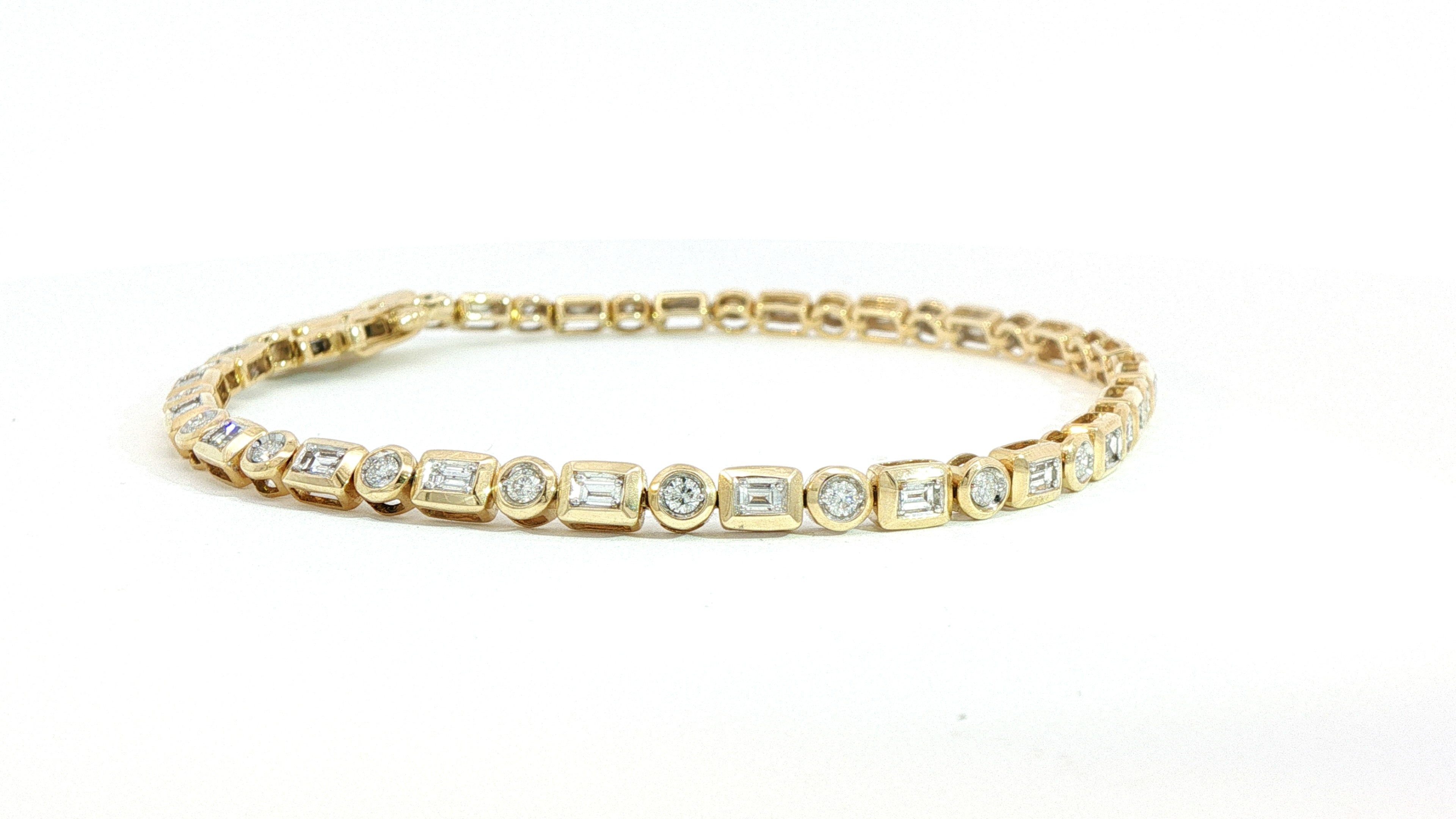 14 KT YELLOW GOLD BEZEL SET TENNIS BRACELET