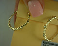 14 KT YELLOW GOLD 0.11 TCW DIAMOND OVAL HOOPS