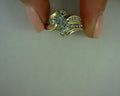 BAGUETTE AND ROUND DIAMOND RING .14 BG  .80 RD 10 KARAT