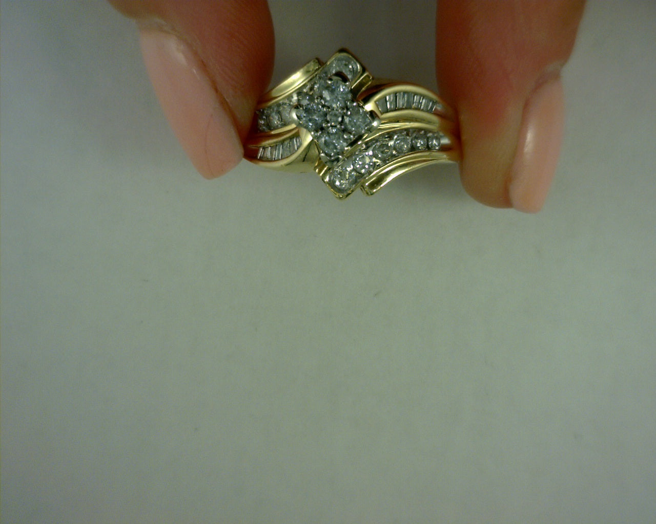 BAGUETTE AND ROUND DIAMOND RING .14 BG  .80 RD 10 KARAT