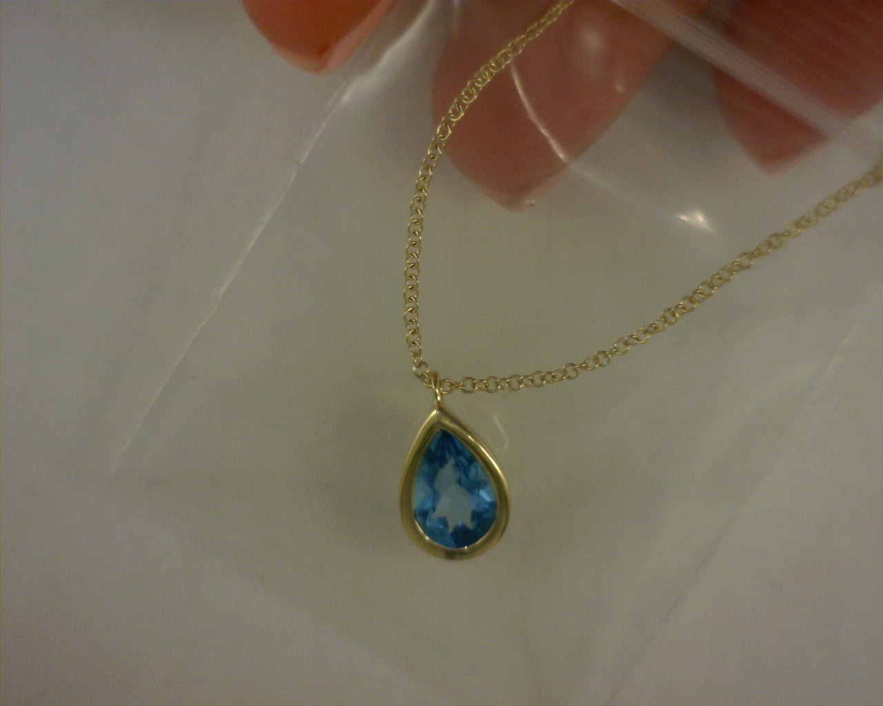 14 KARAT YELLOW GOLD TEARDROP BLUE TOPAZ PENDANT #S2149653