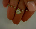 14 KARAT YELLOW GOLD BUJUKAN AND WHITE SAPPHIRE HEART CHARM