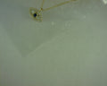 14 KARAT YELLOW GOLD DIAMOND AND SAPPHIRE EVIL0EYE PENDANT #S2147937