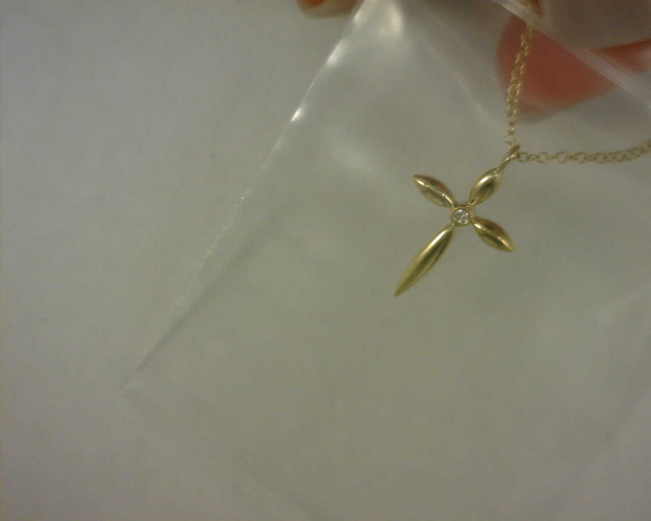 #S149729  14 KARAT YELLOW GOLD DIAMOND CROSS