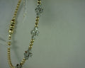 #S2166630  14KT MIX OF WHITE AND YELLOW GOLD DIAMOND BANGLE