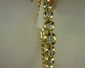 #S2166639 14KT YELLOW GOLD BUJUKAN AND GRADUATING SPLIT BANGLE