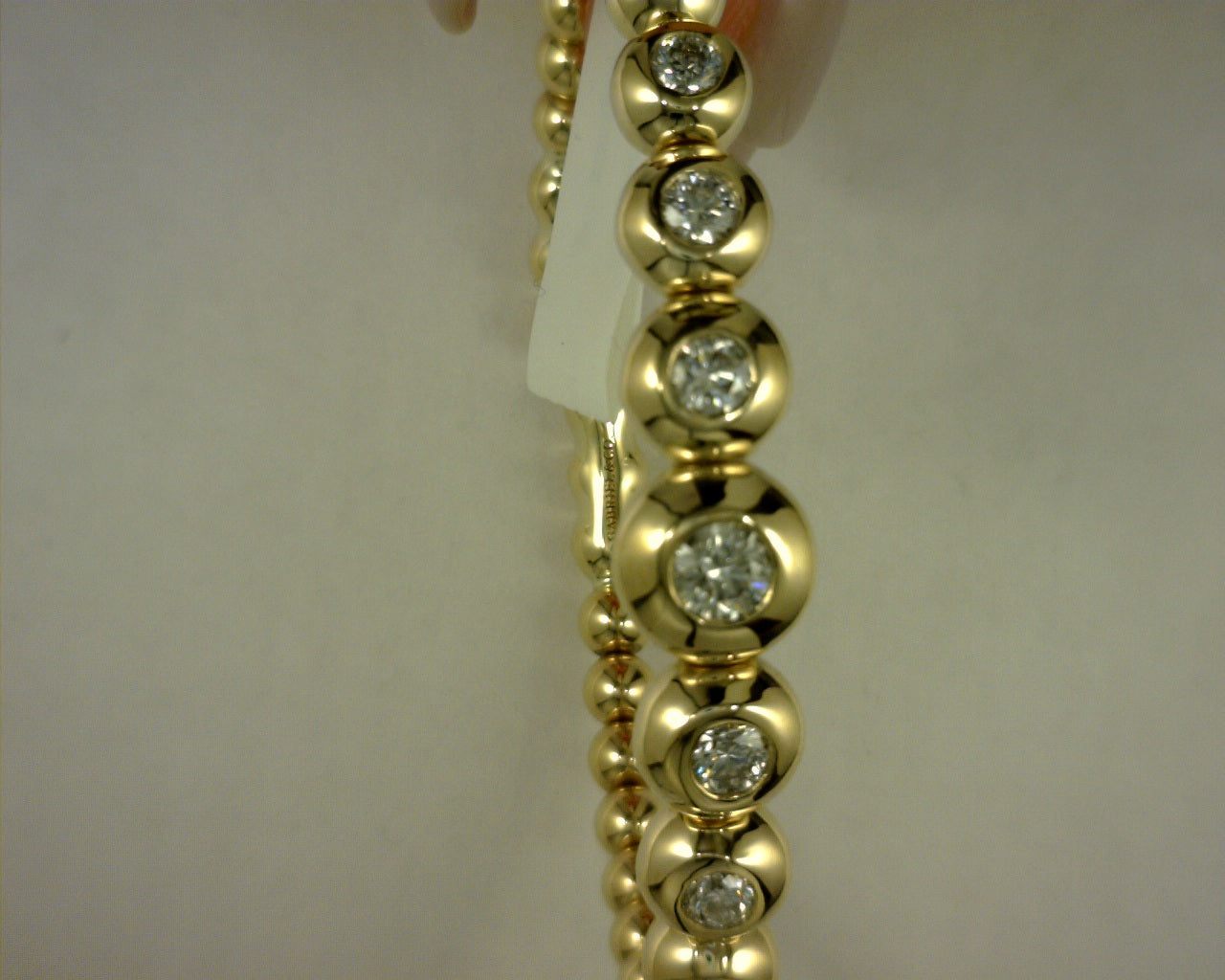 #S2166639 14KT YELLOW GOLD BUJUKAN AND GRADUATING SPLIT BANGLE