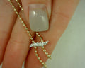#S2166660 14 KT WHITE AND YELLOW GOLD  BUJUKAN AND DIAMOND Y NECKLACE