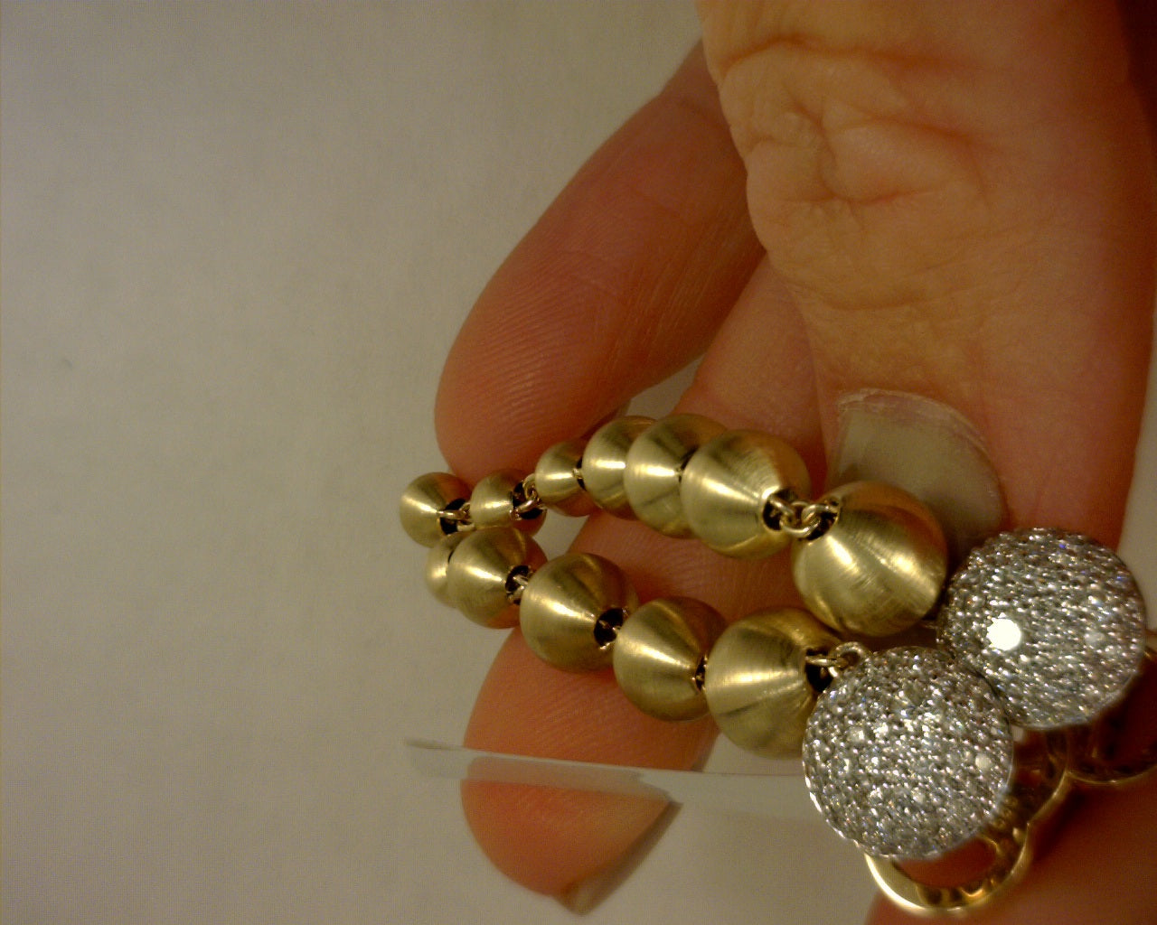 14 KARAT WHITE AND YELLOW GOLD DIAMOND BUJUKAN BALL GRADUATING STUD #S2166305
