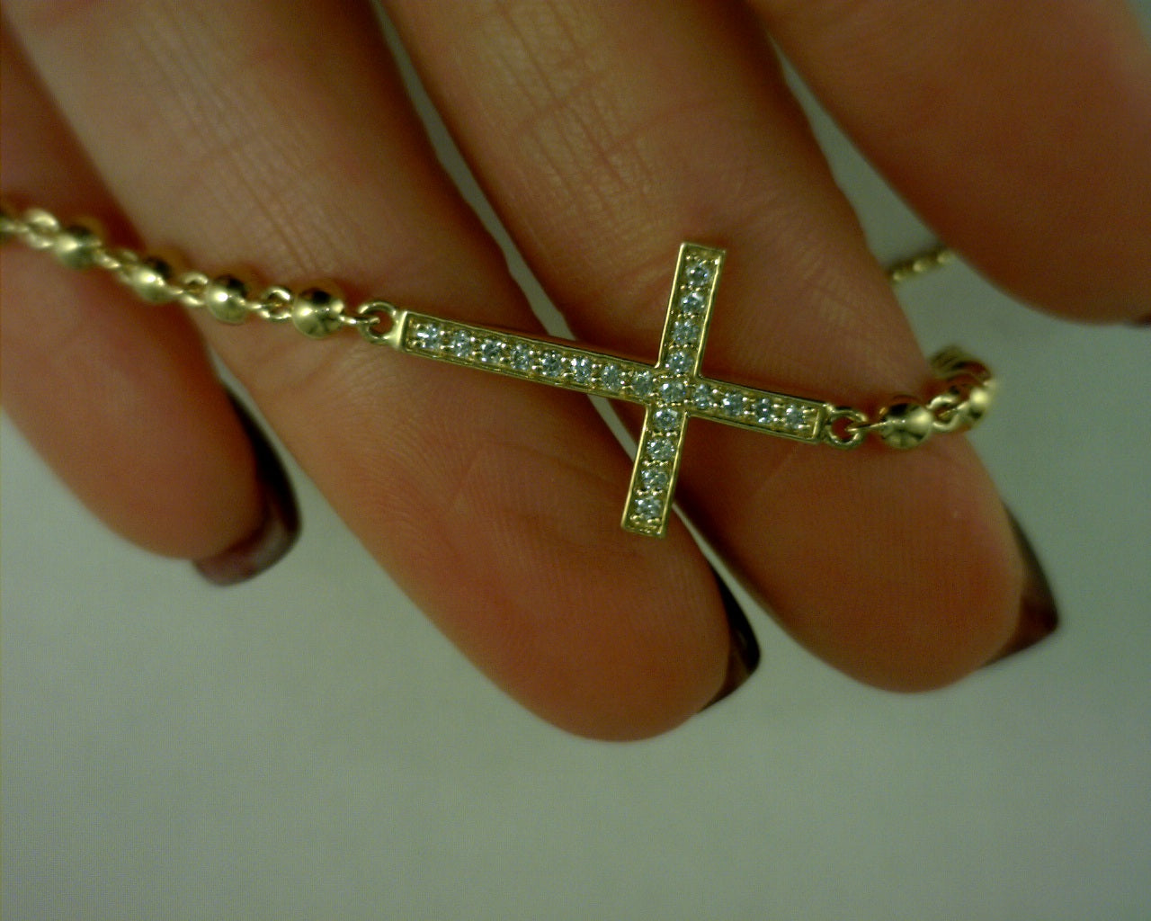 14KT YELLOW GOLD CROSS BRACELET RD21/0.18 3.8GR