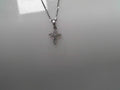 14 KARAT WHITE GOLD DIASMOND CROSS .44 TDW