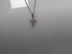 14 KARAT WHITE GOLD DIASMOND CROSS .44 TDW