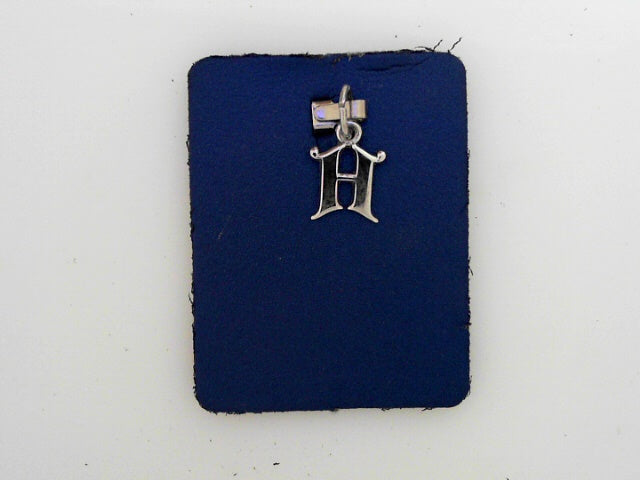 Initial H Charm