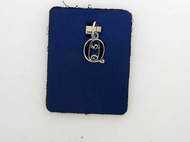 Initial Q Charm