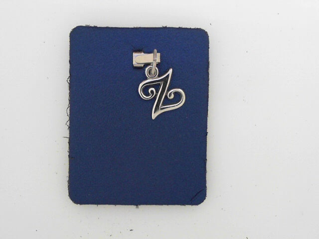 Initial Z Charm