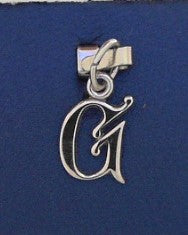 Initial G Charm