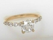 14ky 1.00 ctw center with shared prong Eng Ring