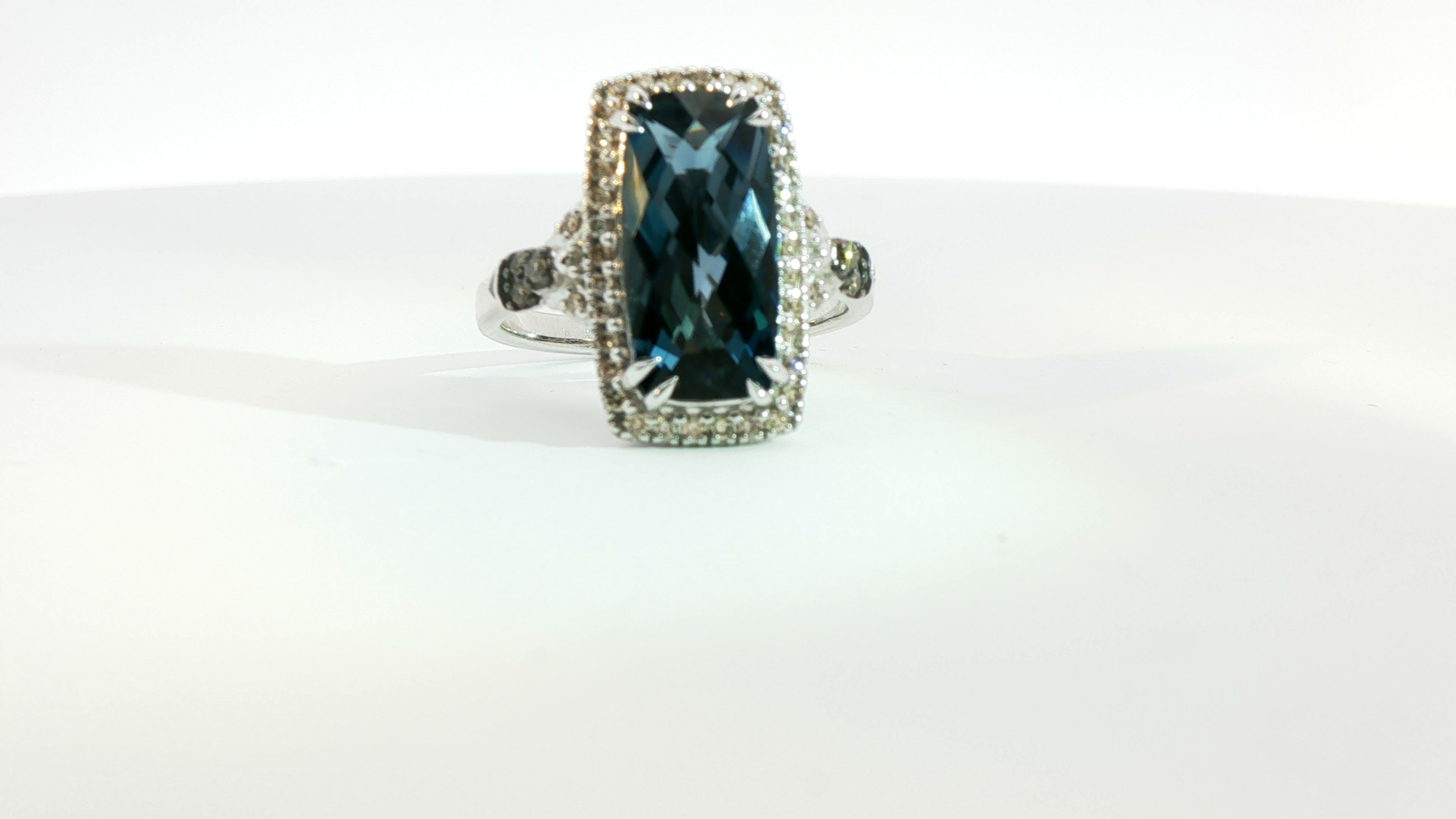 14k W/G Ring .25 DIA 4.10 Blue Topaz