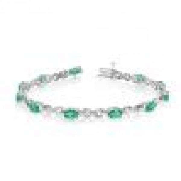 10K White Gold Oval Aquamarine and Diamond Bracelet