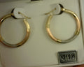 Lady's Two-Tone 14 Karat Large Hoop Earrings
